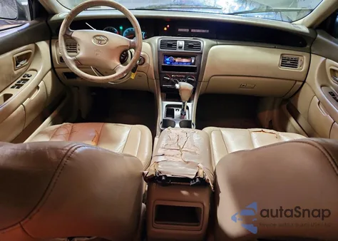 2002 Toyota Avalon Xl z USA, uszkodzony, nr VIN 4T1BF28B12U265994